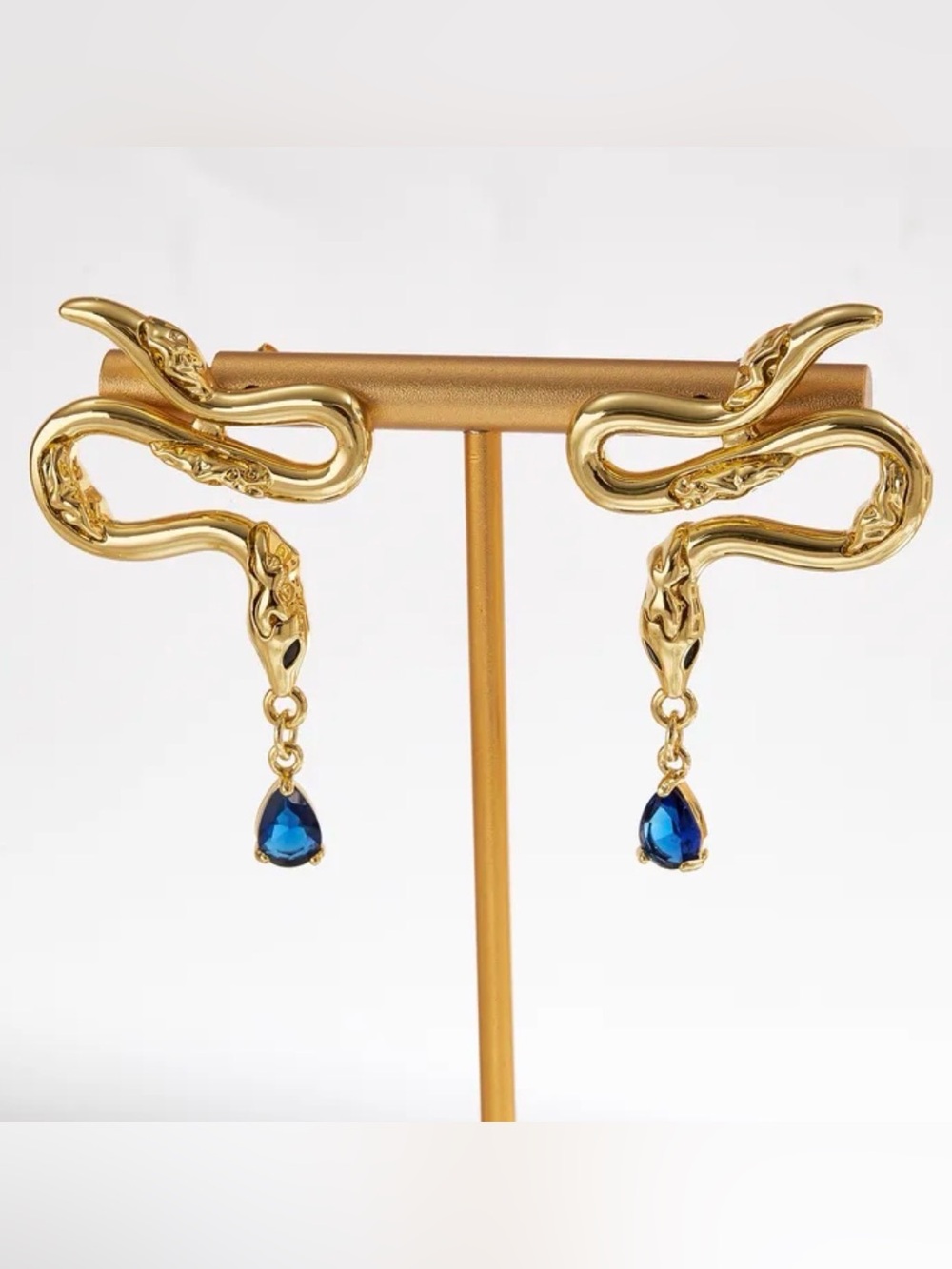Gold Serpent Drop Earrings with Blue Crystal Teardrops